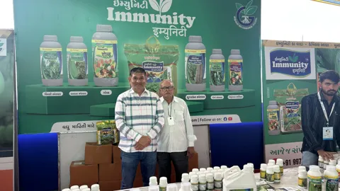 Farmers at the Immunity stall at a farmer fair