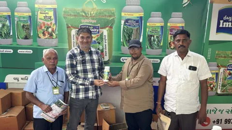 Farmers at the Immunity stall at a farmer fair